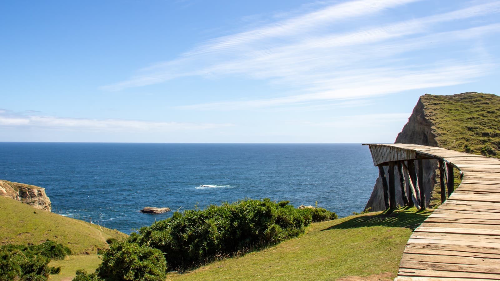 Chonchi — a wooden walkway to a body of water