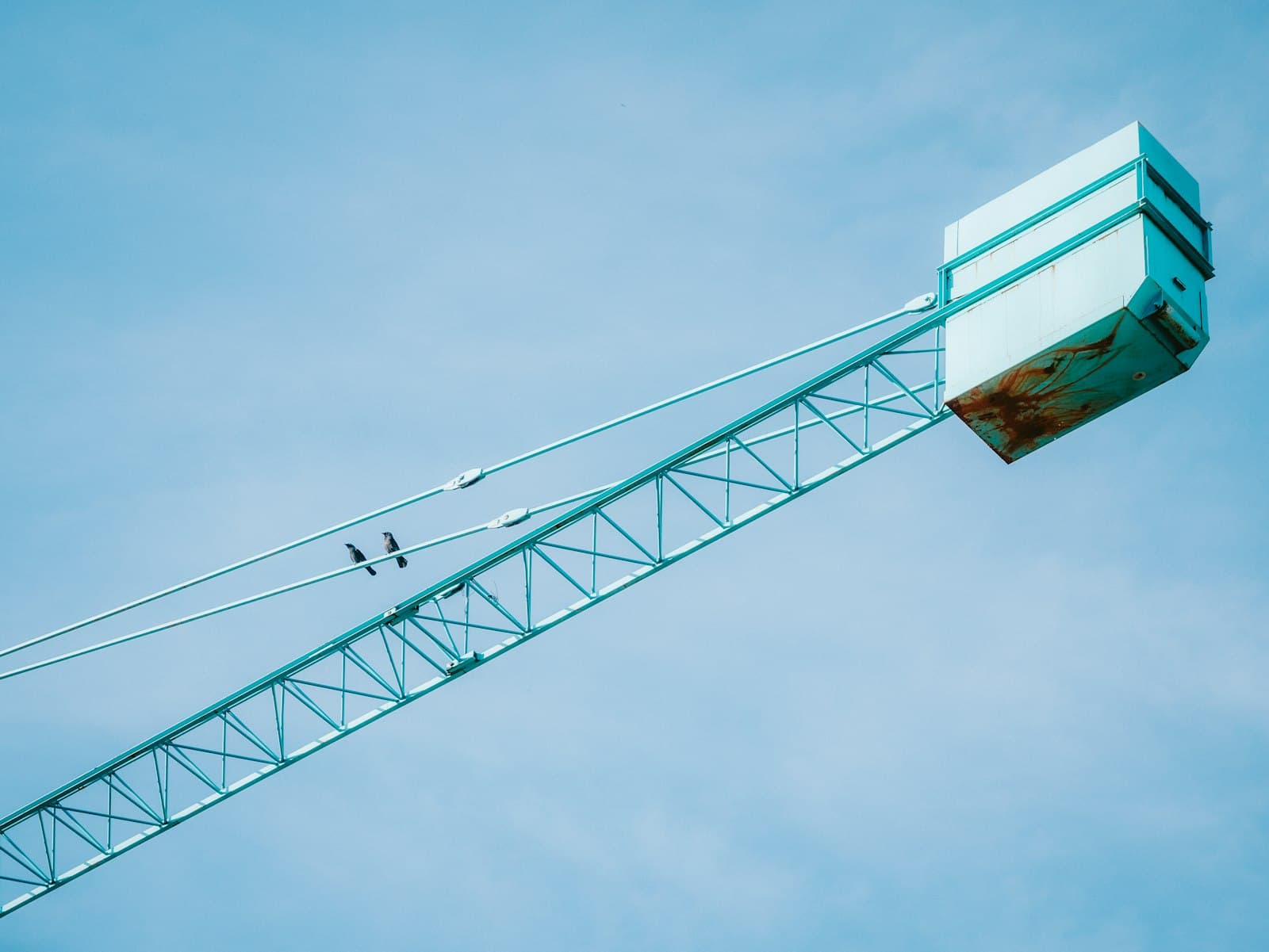 Cingoli — Construction crane against a clear blue sky