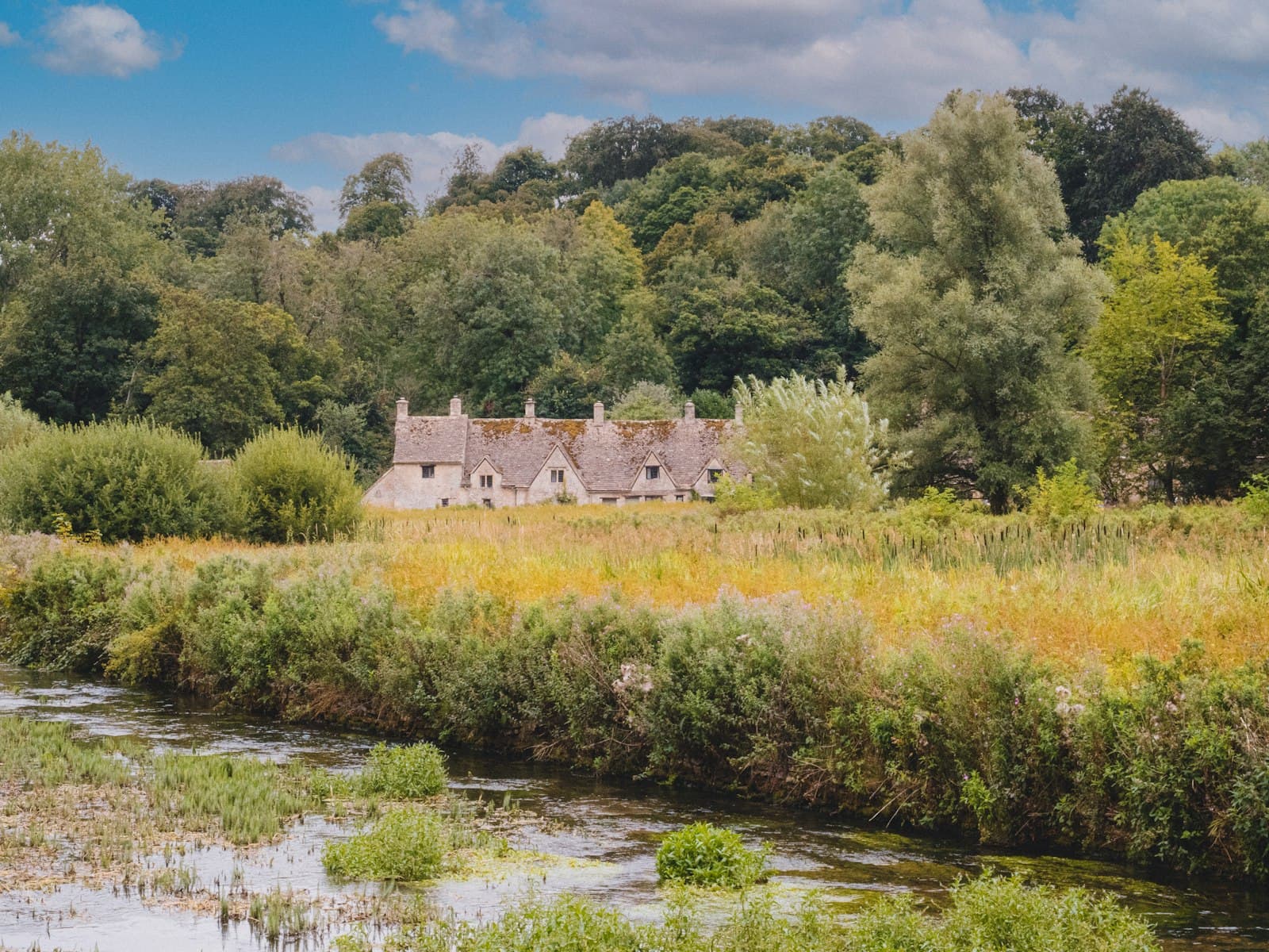 Cirencester — green trees beside river during daytime