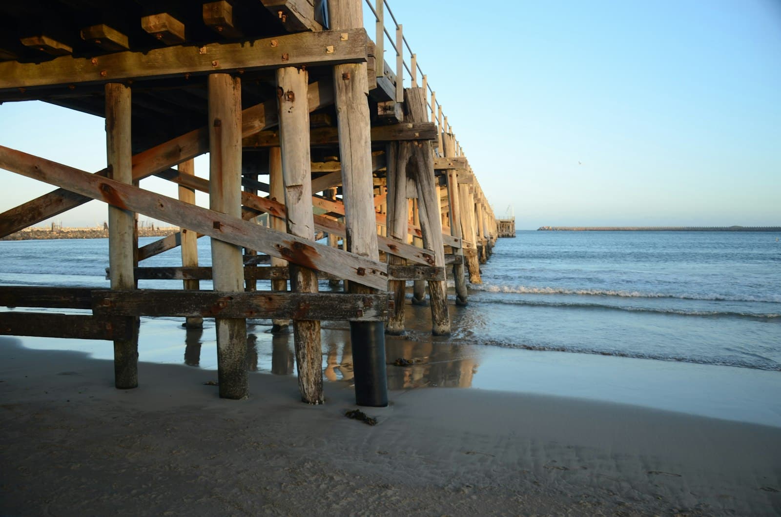 Coffs Harbour — brown wooden dock on beach during daytime