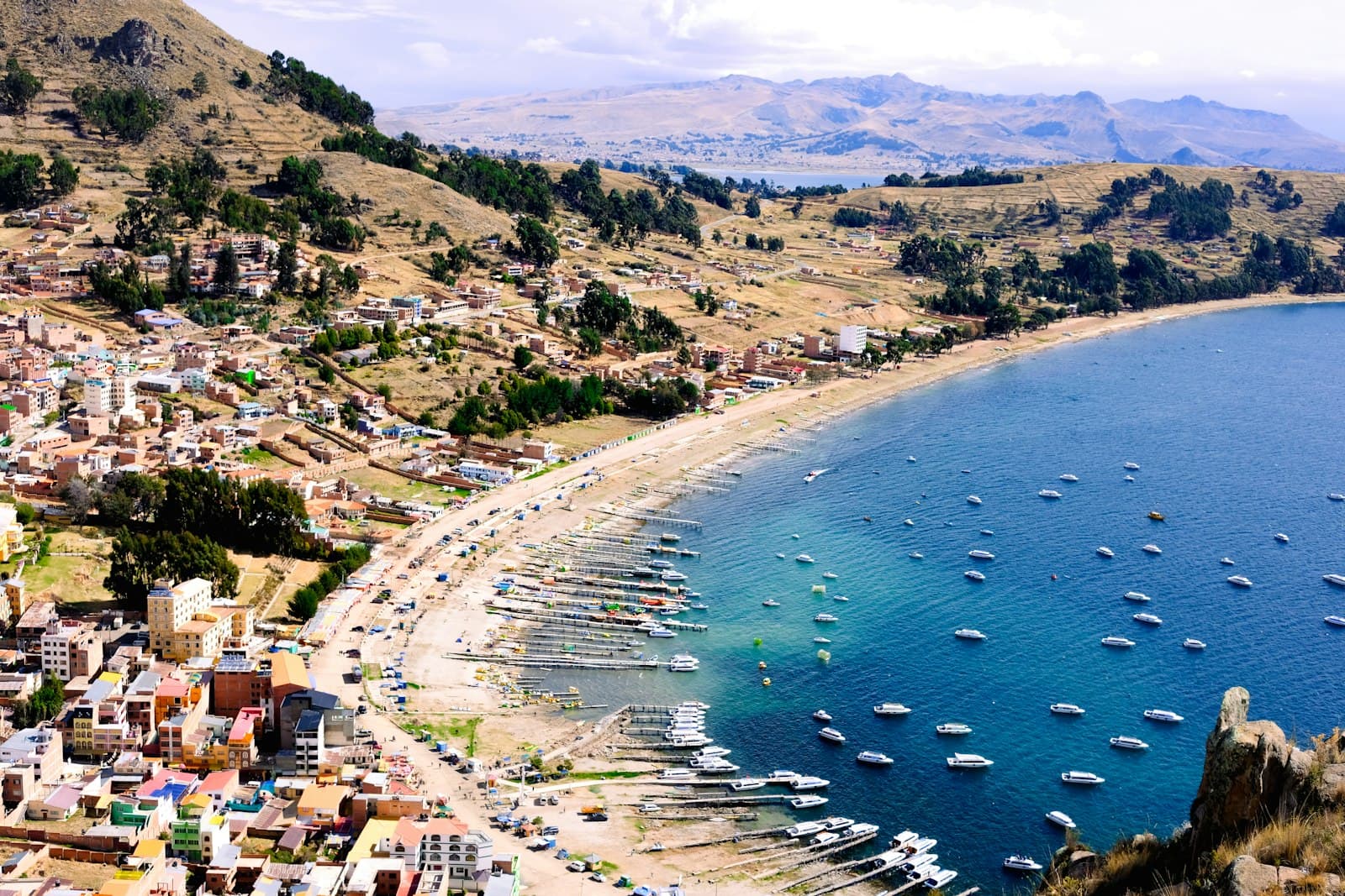 Copacabana — A large body of water filled with lots of boats