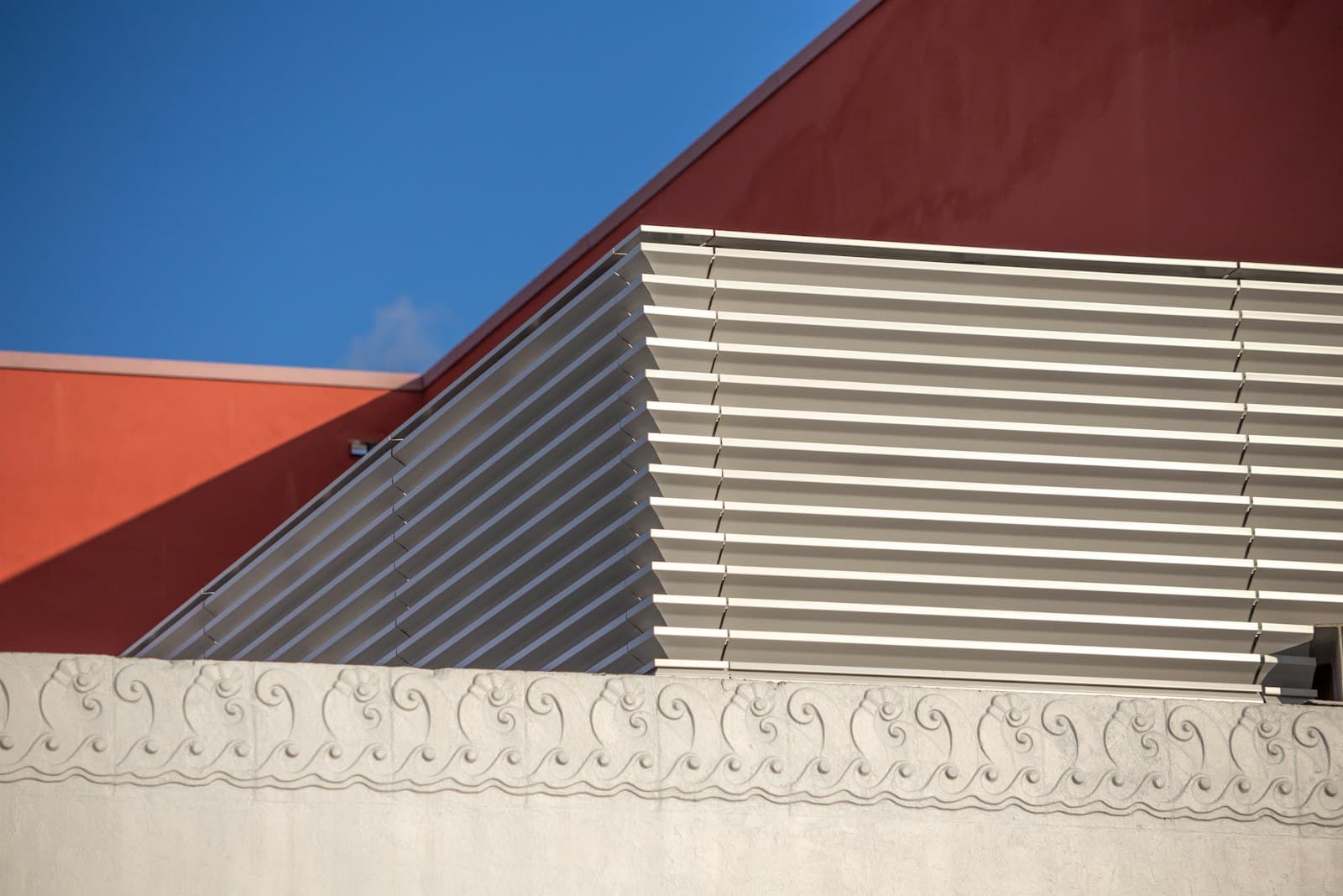 Coral Gables — a close up of a building with a sky in the background