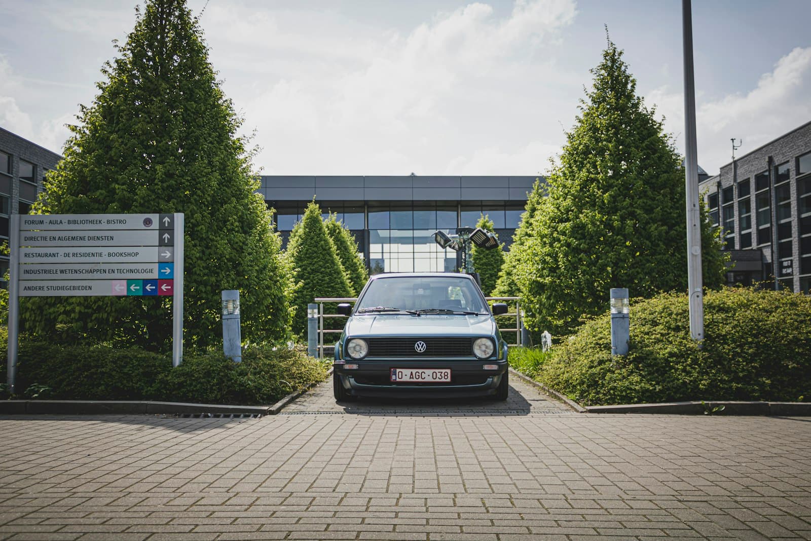 Courtrai — a small car parked in front of a building