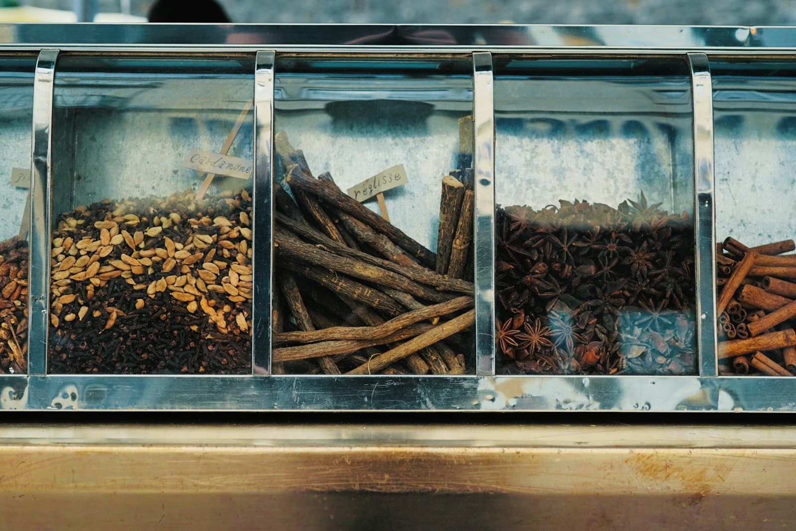 Coutances — focus photography of assorted spices on display counter
