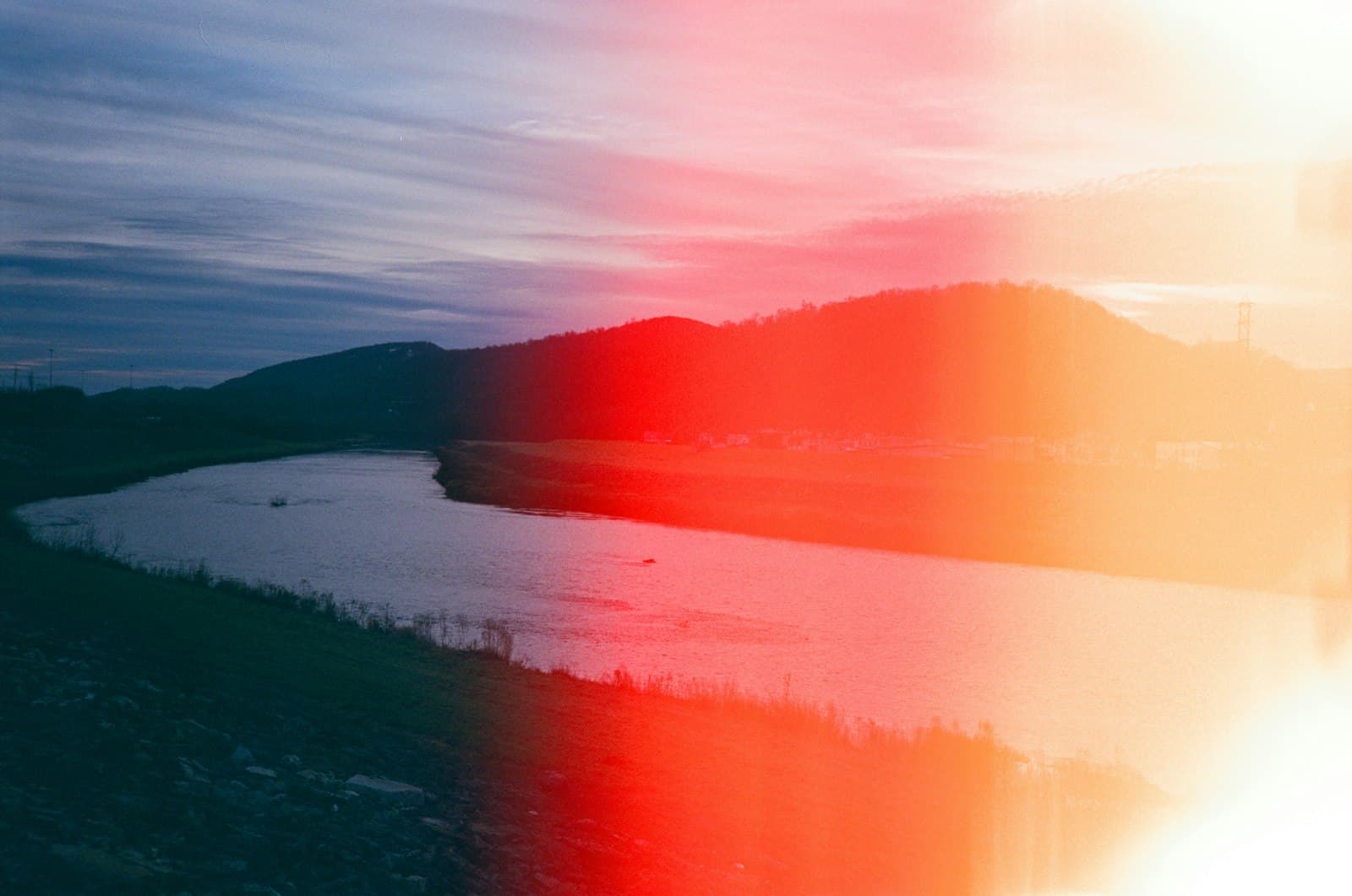 Cumberland — body of water near mountain during sunset