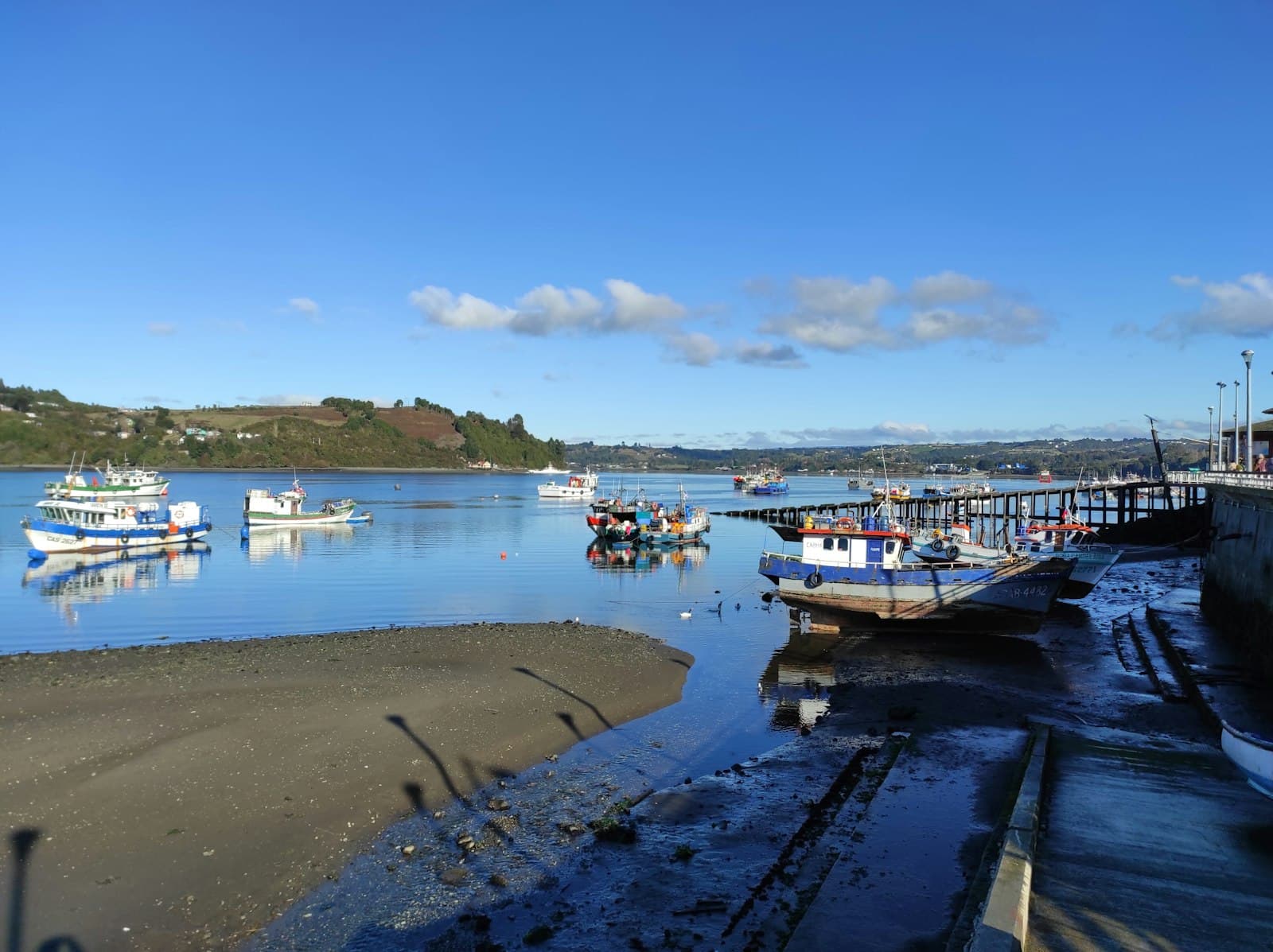 Dalcahue — a group of boats that are sitting in the water