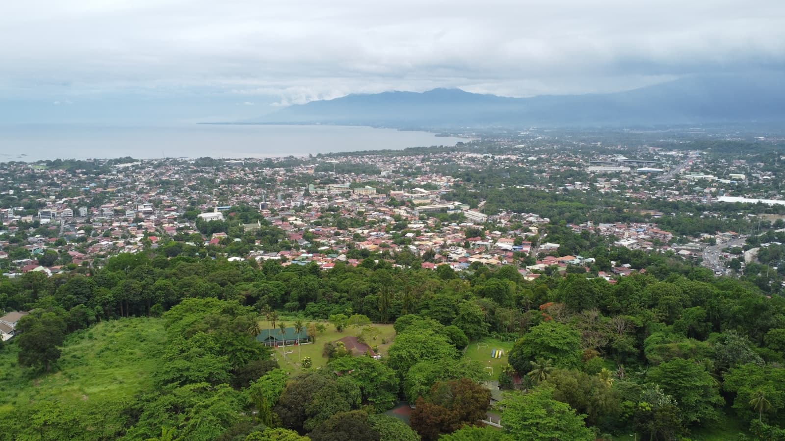 Davao — an aerial view of a city with a lake in the background