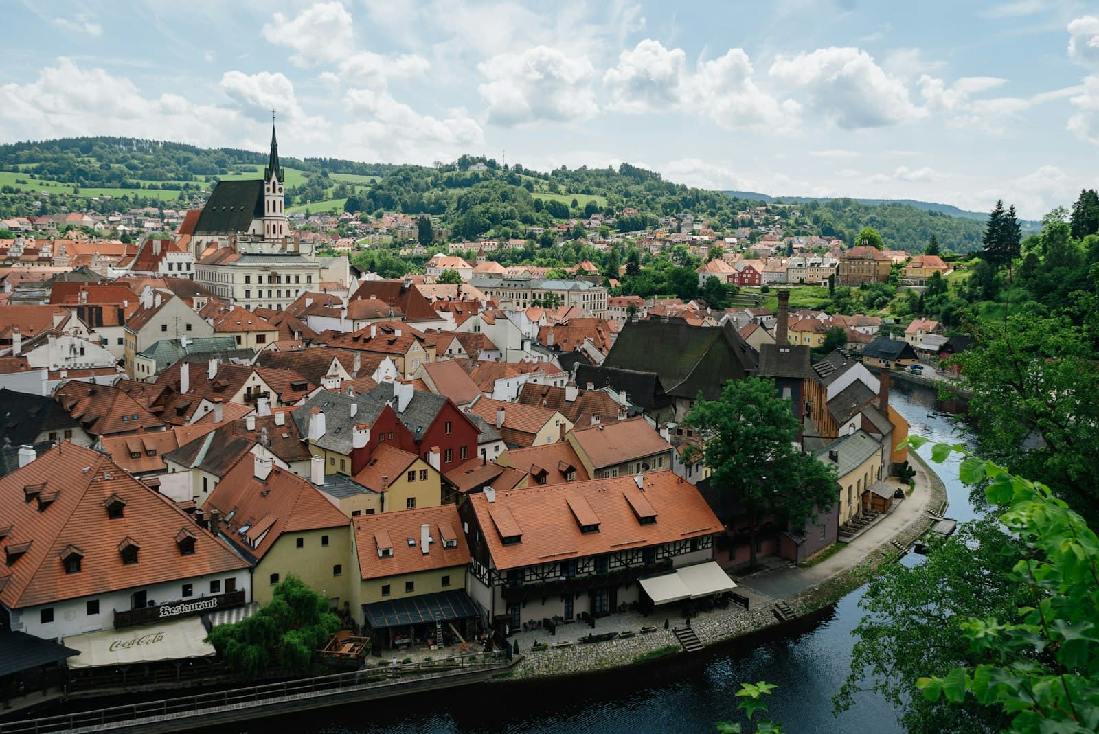 Děčín — a view of a city with a river running through it