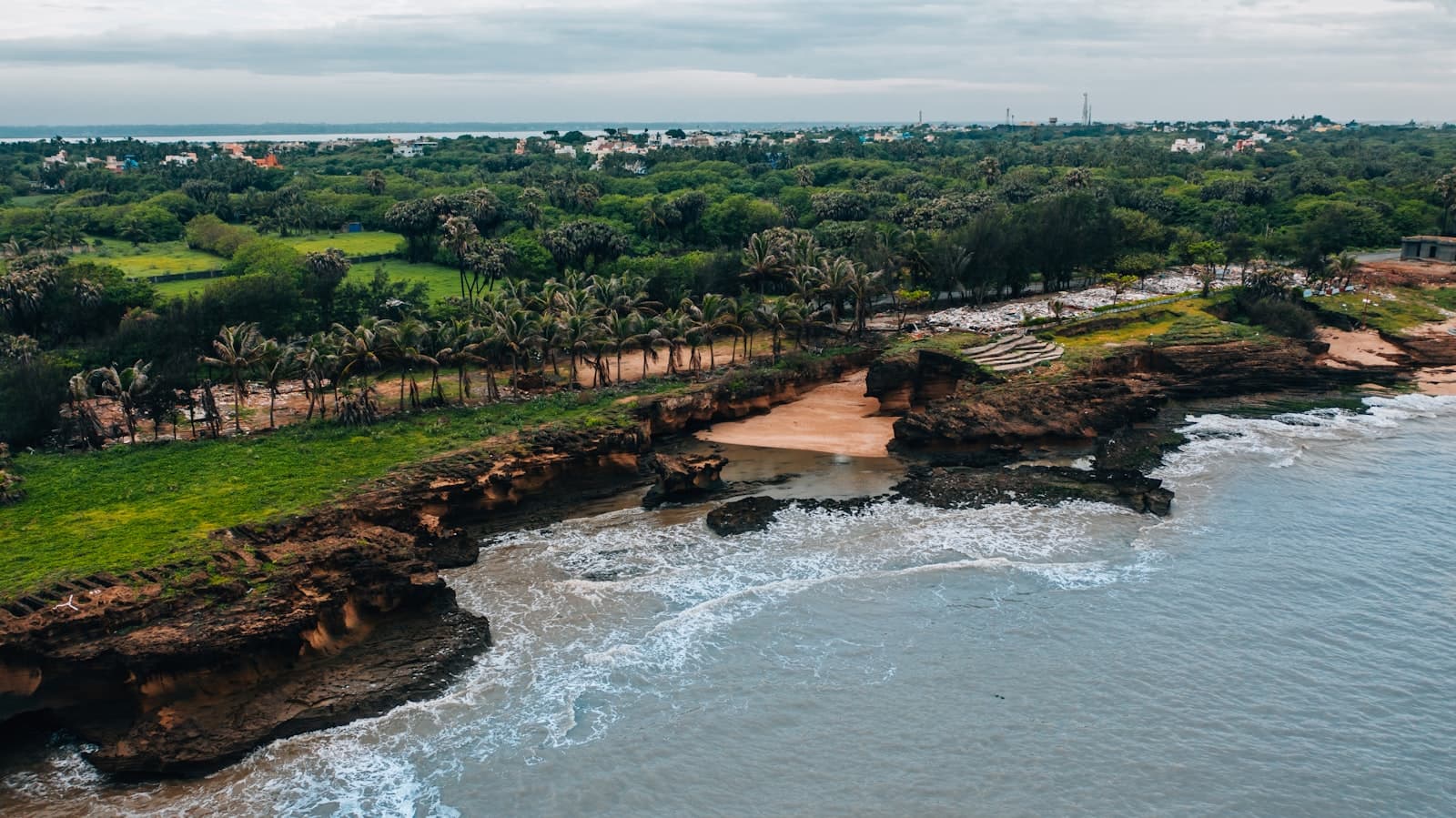 Diu — trees beside body of water