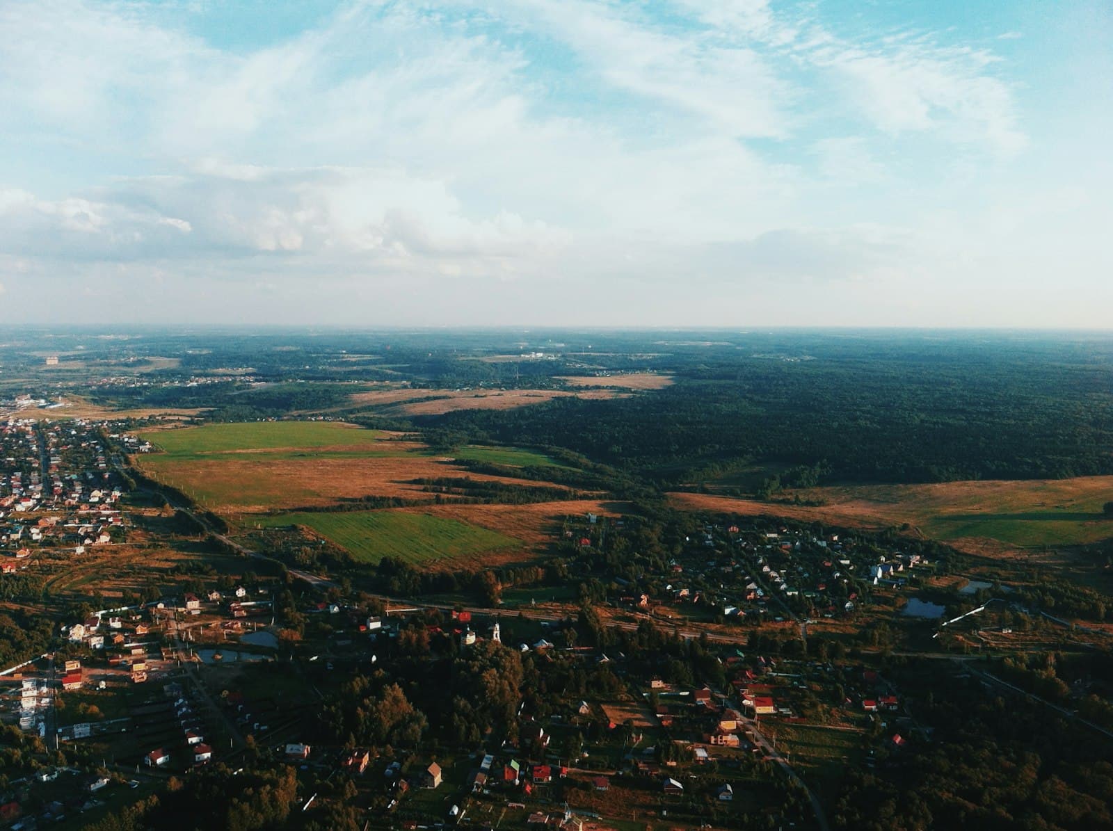 Dmitrov — an aerial view of a small town surrounded by trees
