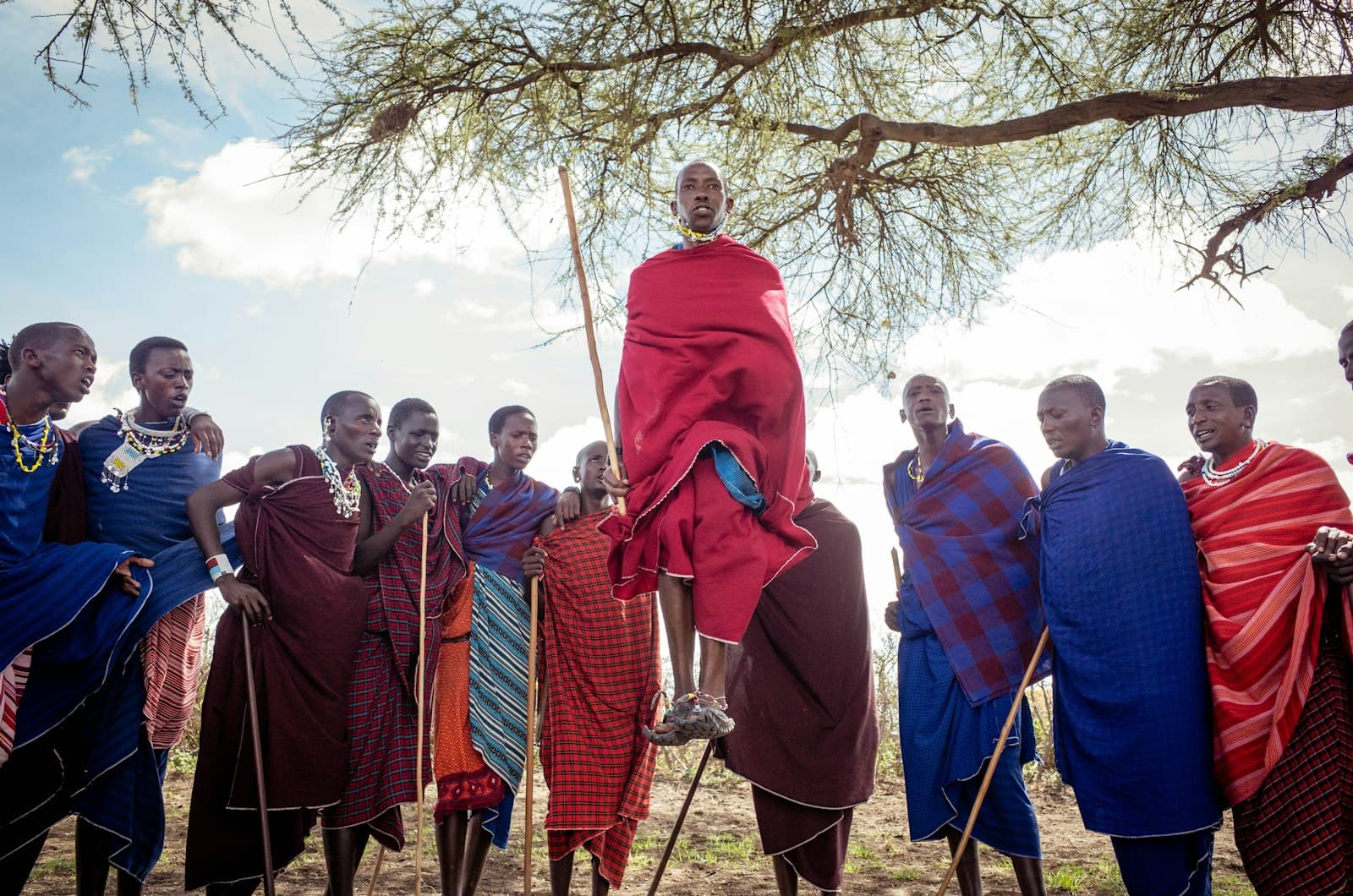 Dodoma — group of people standing on green grass field during daytime