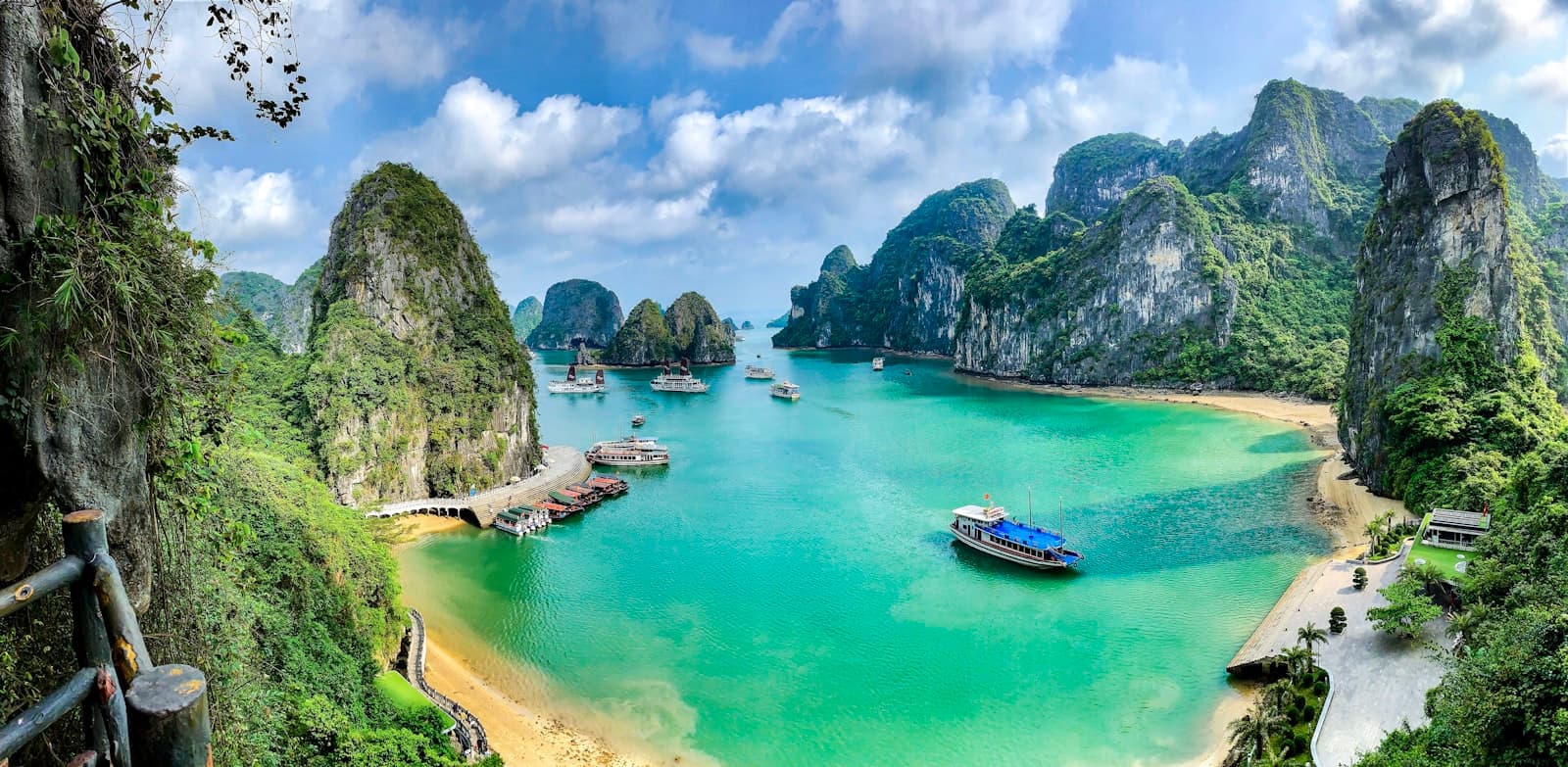 Đồng Hới — a group of boats floating on top of a body of water