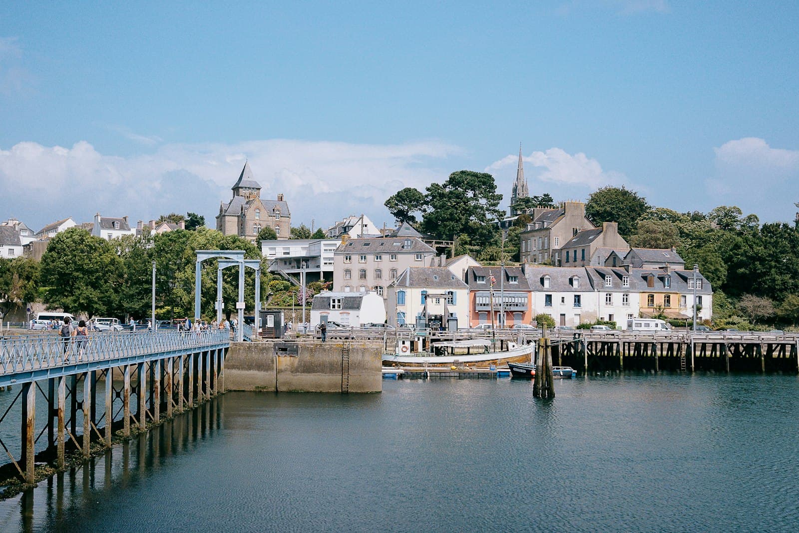 Douarnenez — A body of water with a bunch of buildings in the background