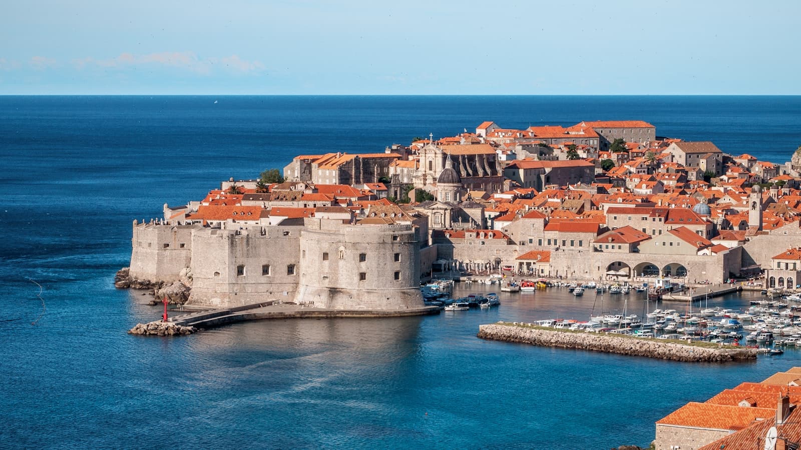 Dubrovnik — white and red concrete houses beside sea