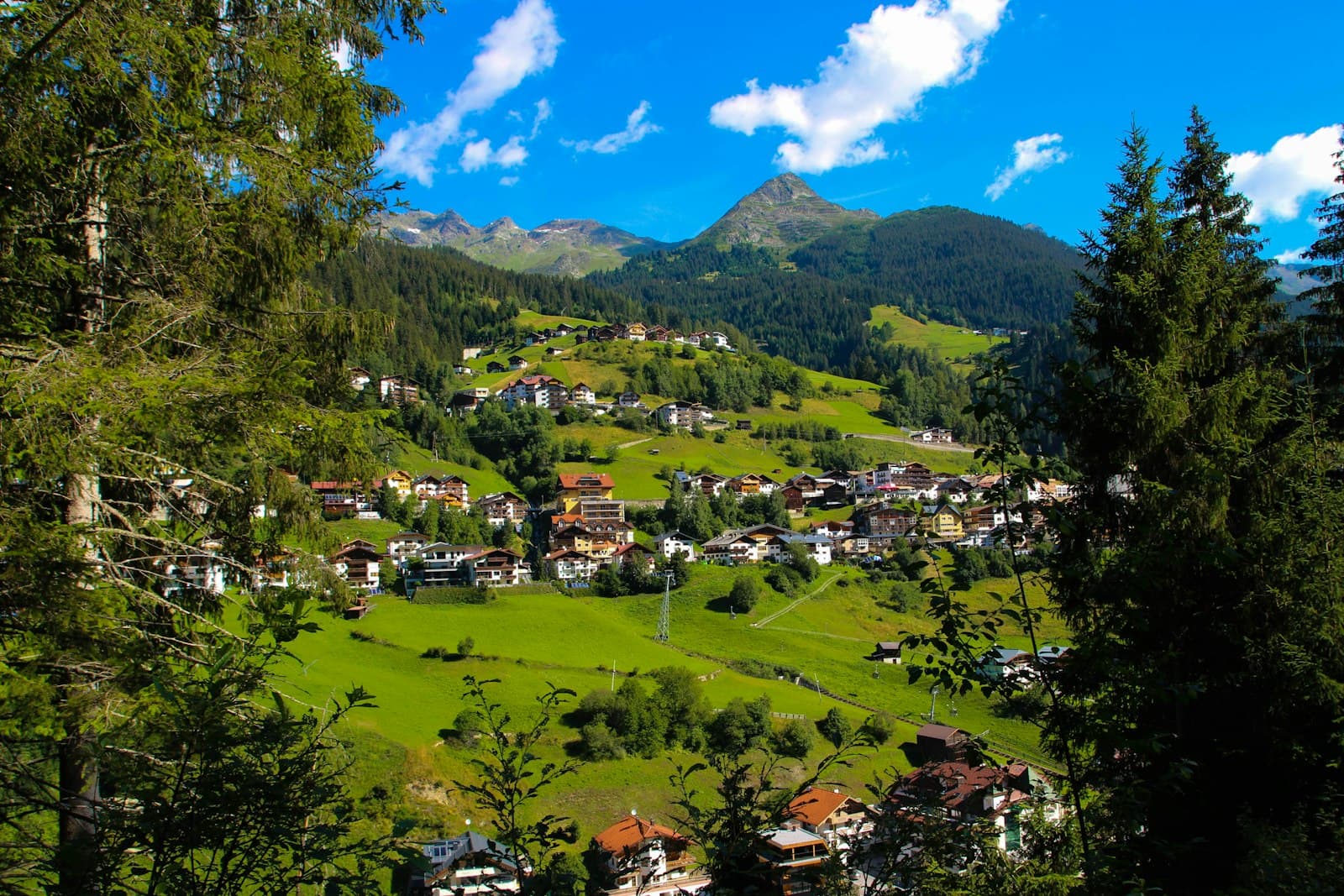 Dürnstein — green trees and mountains under blue sky during daytime