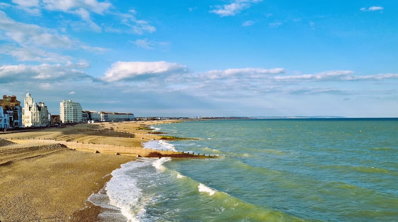 Eastbourne — a view of a beach with buildings in the background