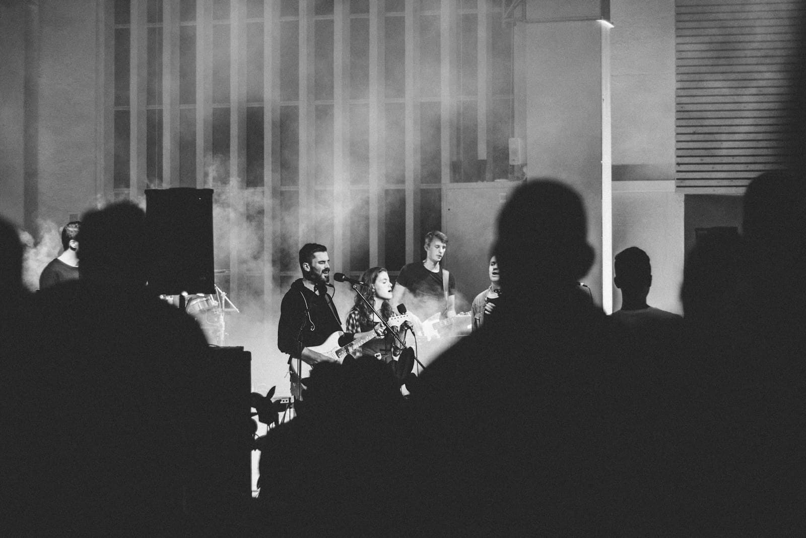 Ede — man standing while singing on stage