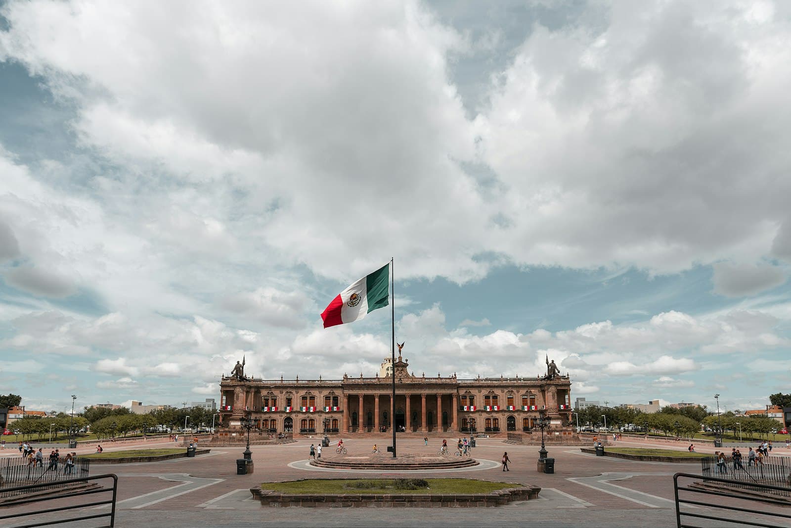 El Fuerte — white, green, and red flag near building during daytime photo