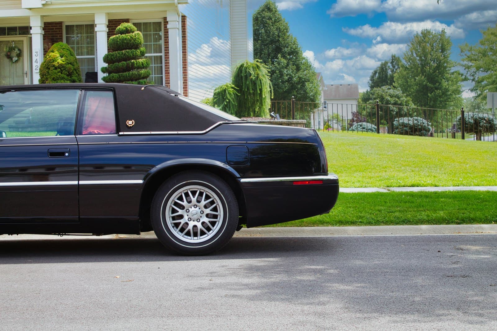 Elgin — a black car parked in front of a house