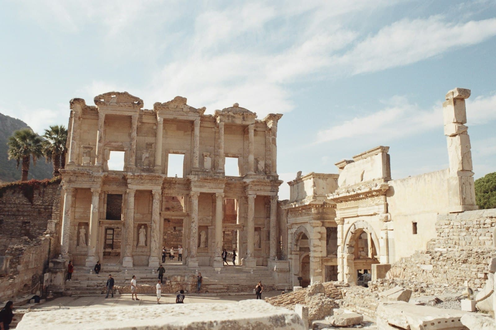 Ephesus — a group of people standing in front of a building