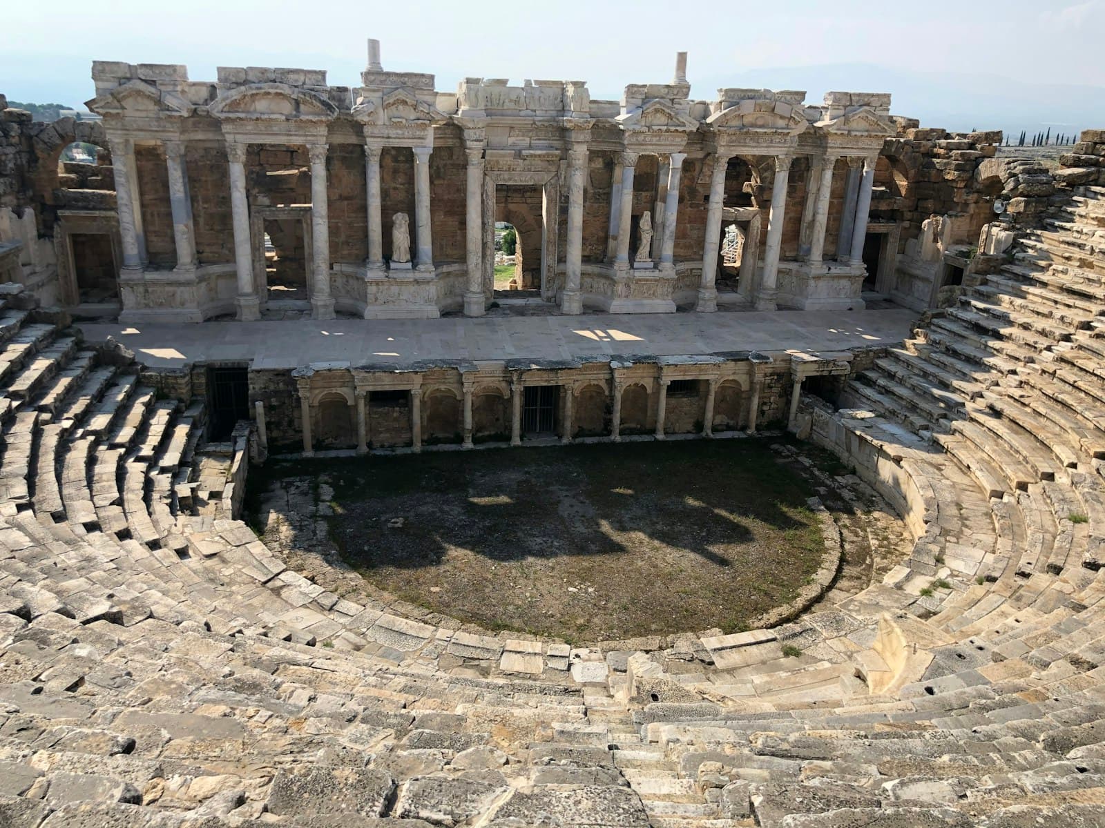 Ephesus — brown concrete building during daytime