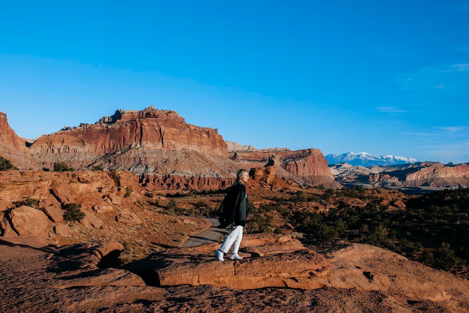 Eureka — a man standing on top of a rock formation