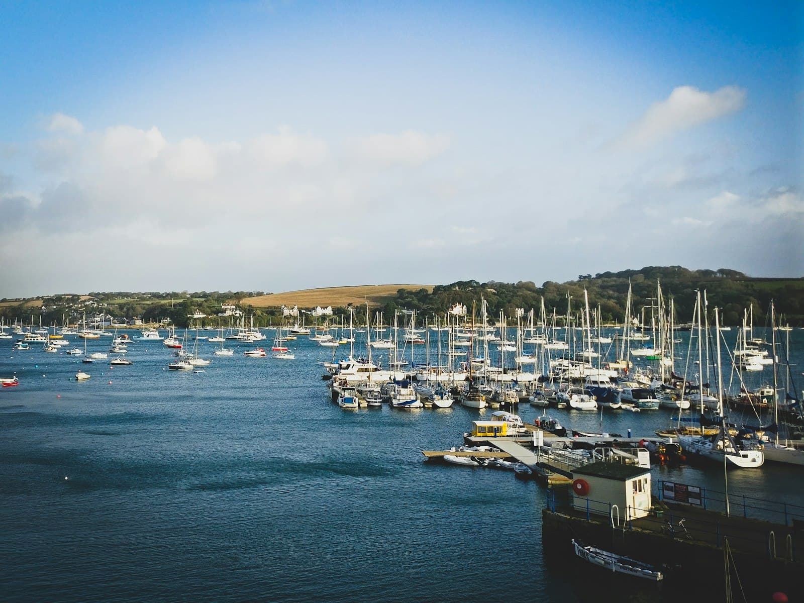 Falmouth — white and black boat on sea during daytime