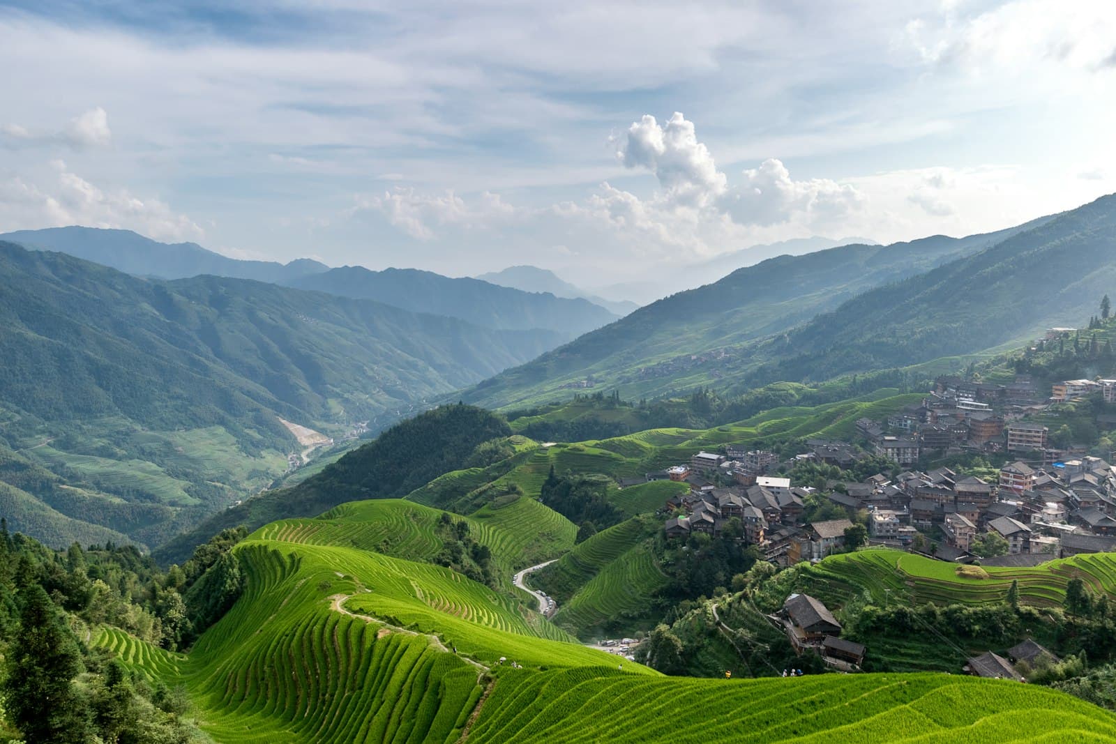 Fenghuang — aerial view of green mountain during daytime