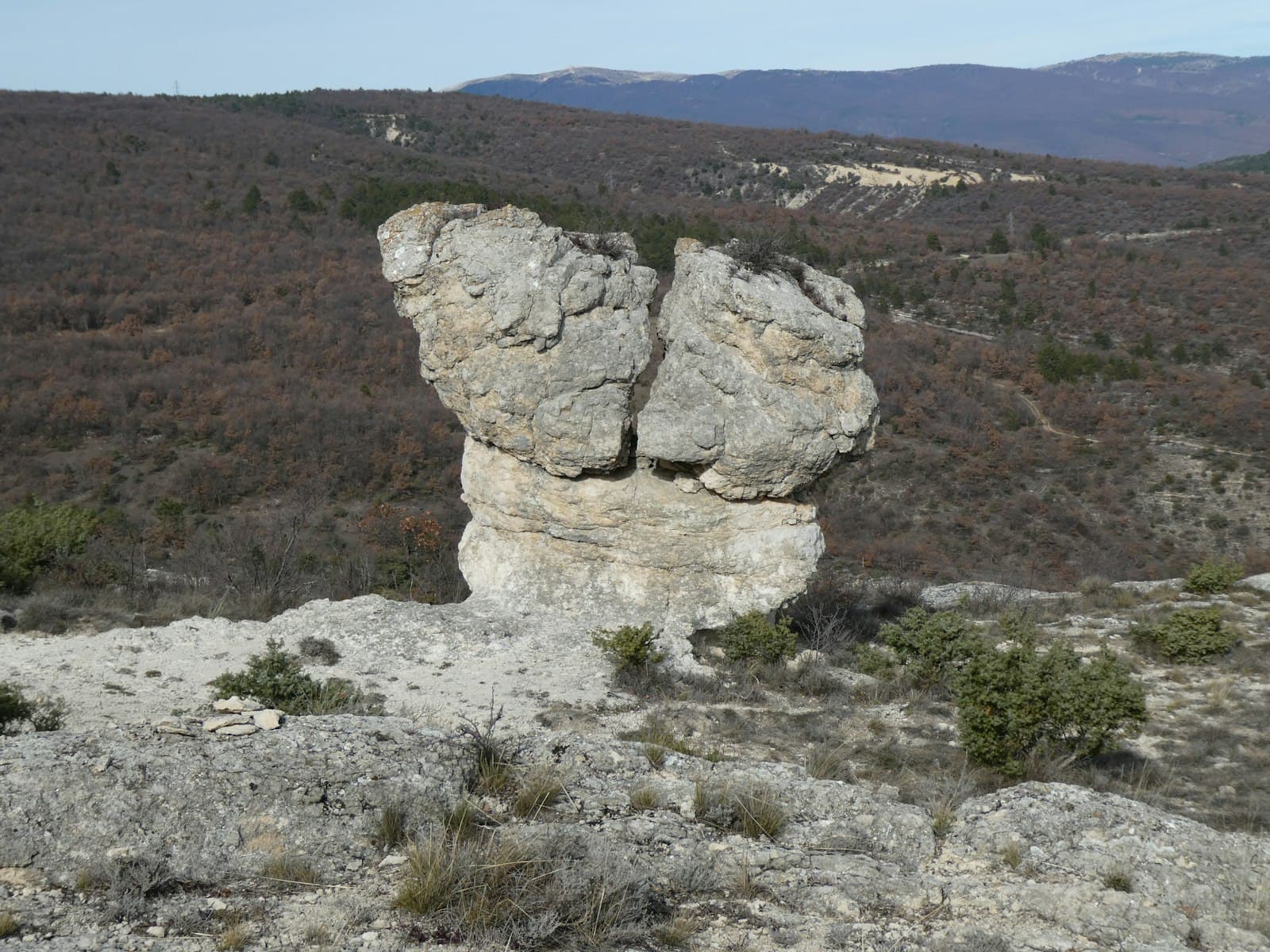 Forcalquier — a large rock in the middle of a field