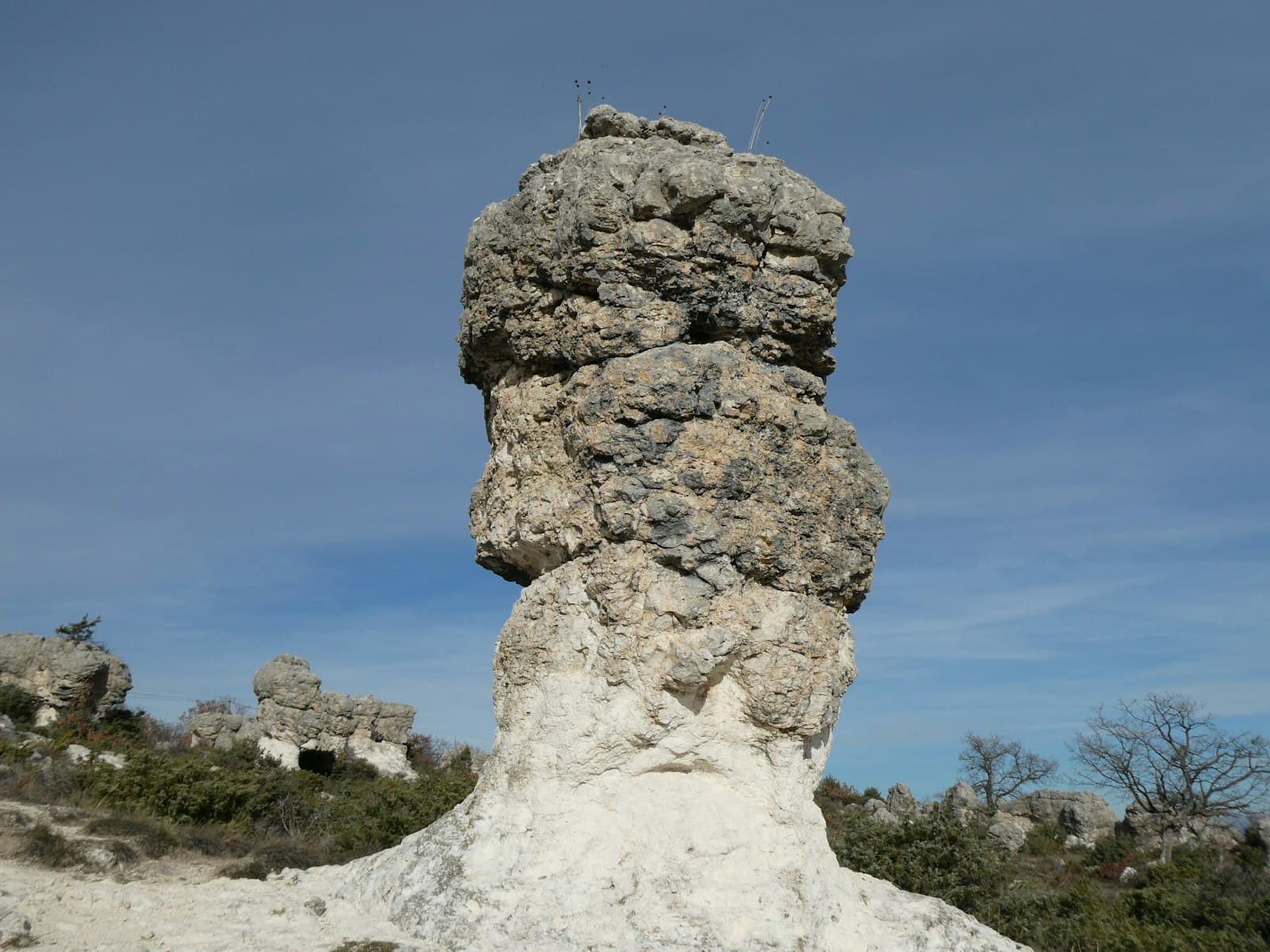 Forcalquier — a large rock formation in the middle of a field