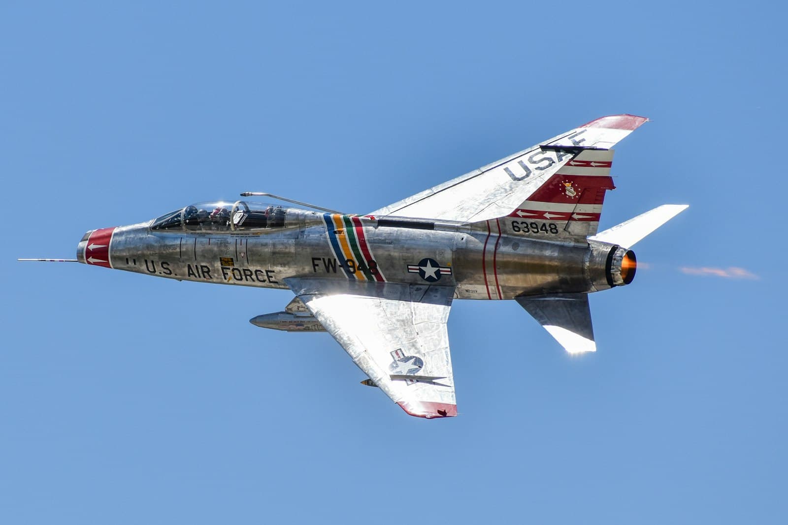 Fort Wayne — A fighter jet flying through a blue sky