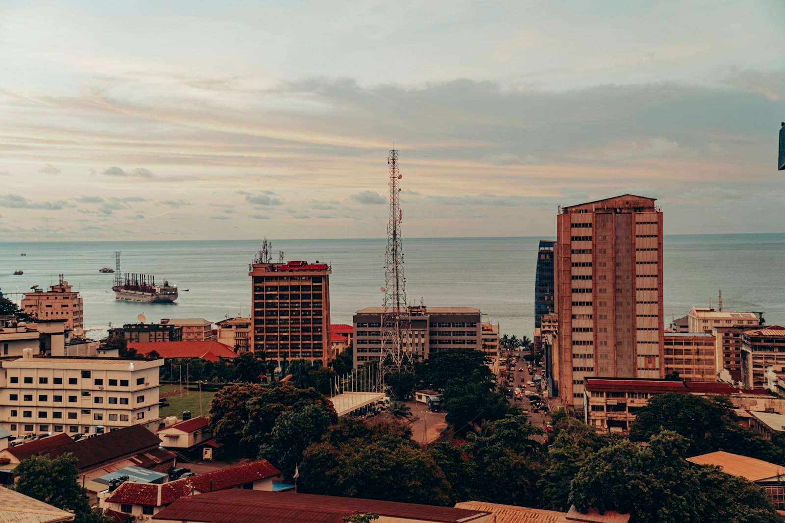 Freetown — a view of a city with a large body of water in the background