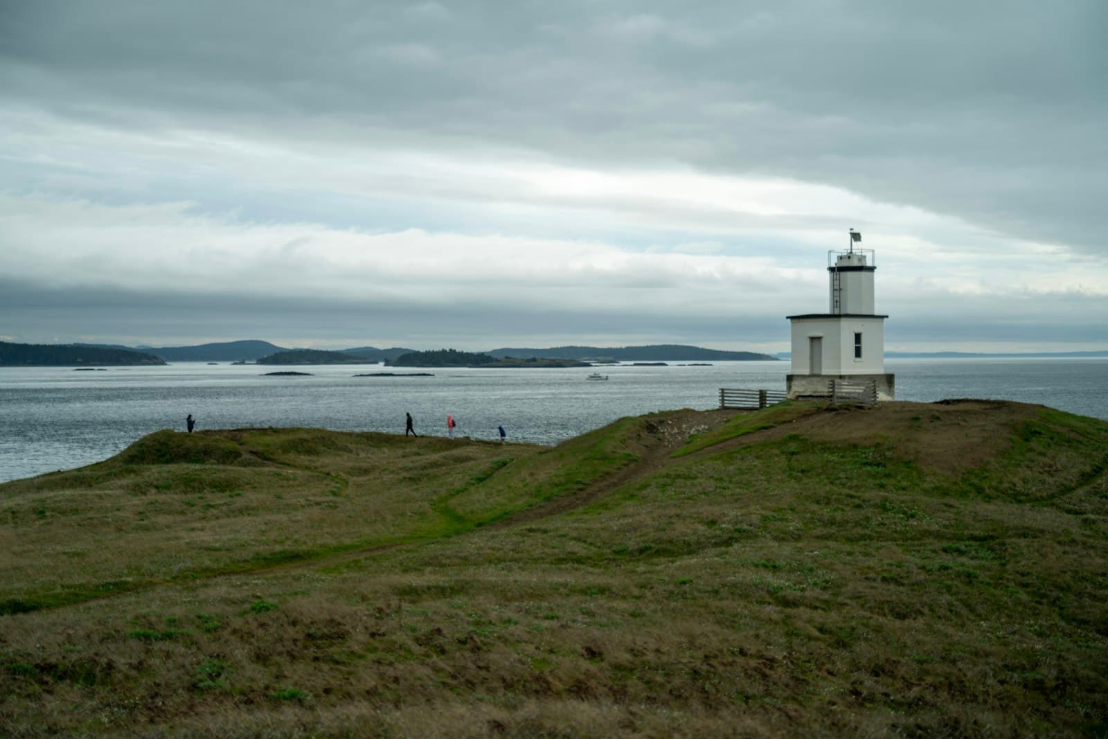 Friday Harbor — a lighthouse on a grassy hill overlooking the ocean