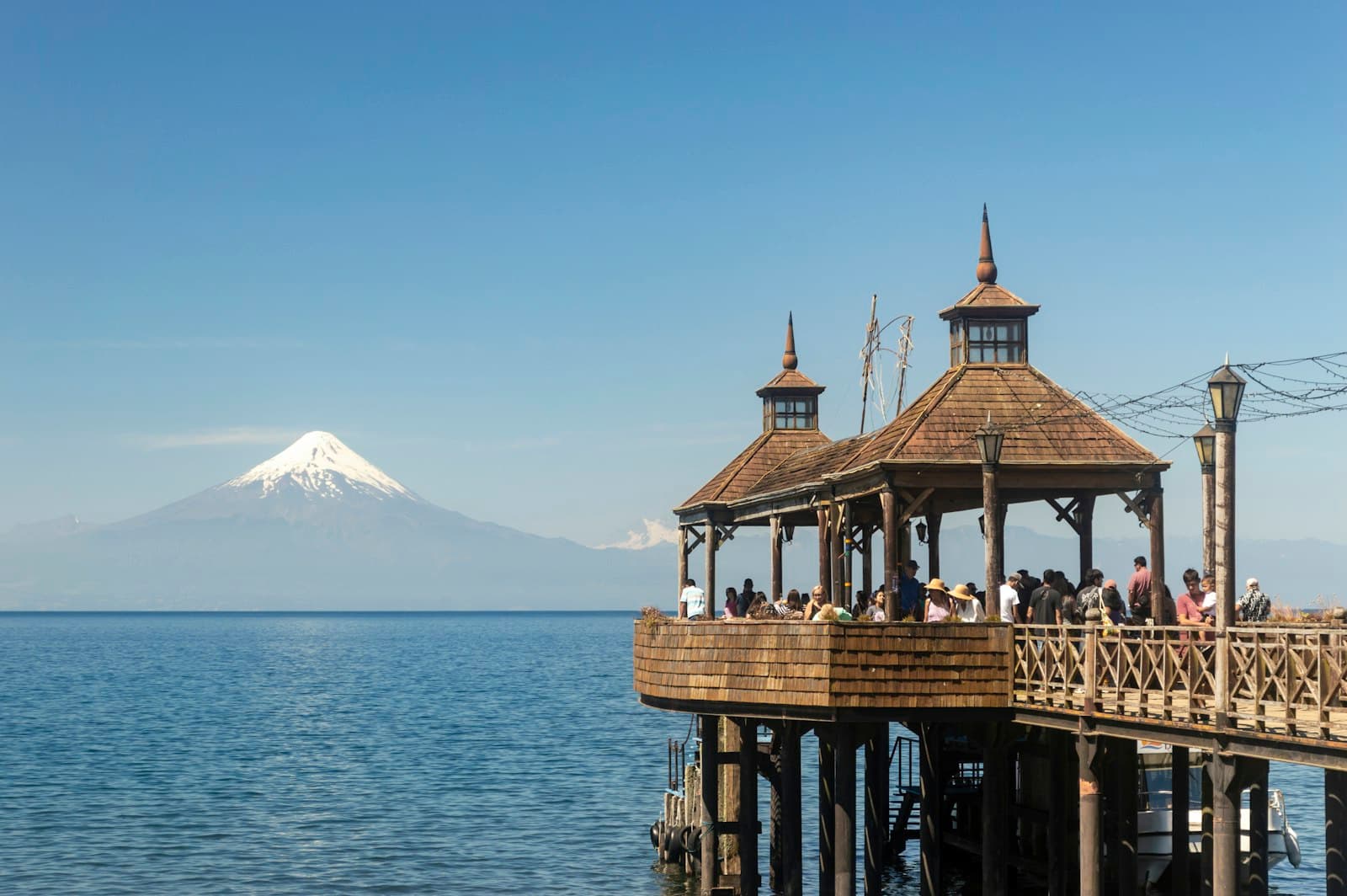 Frutillar — a pier with a gazebo and a mountain in the background