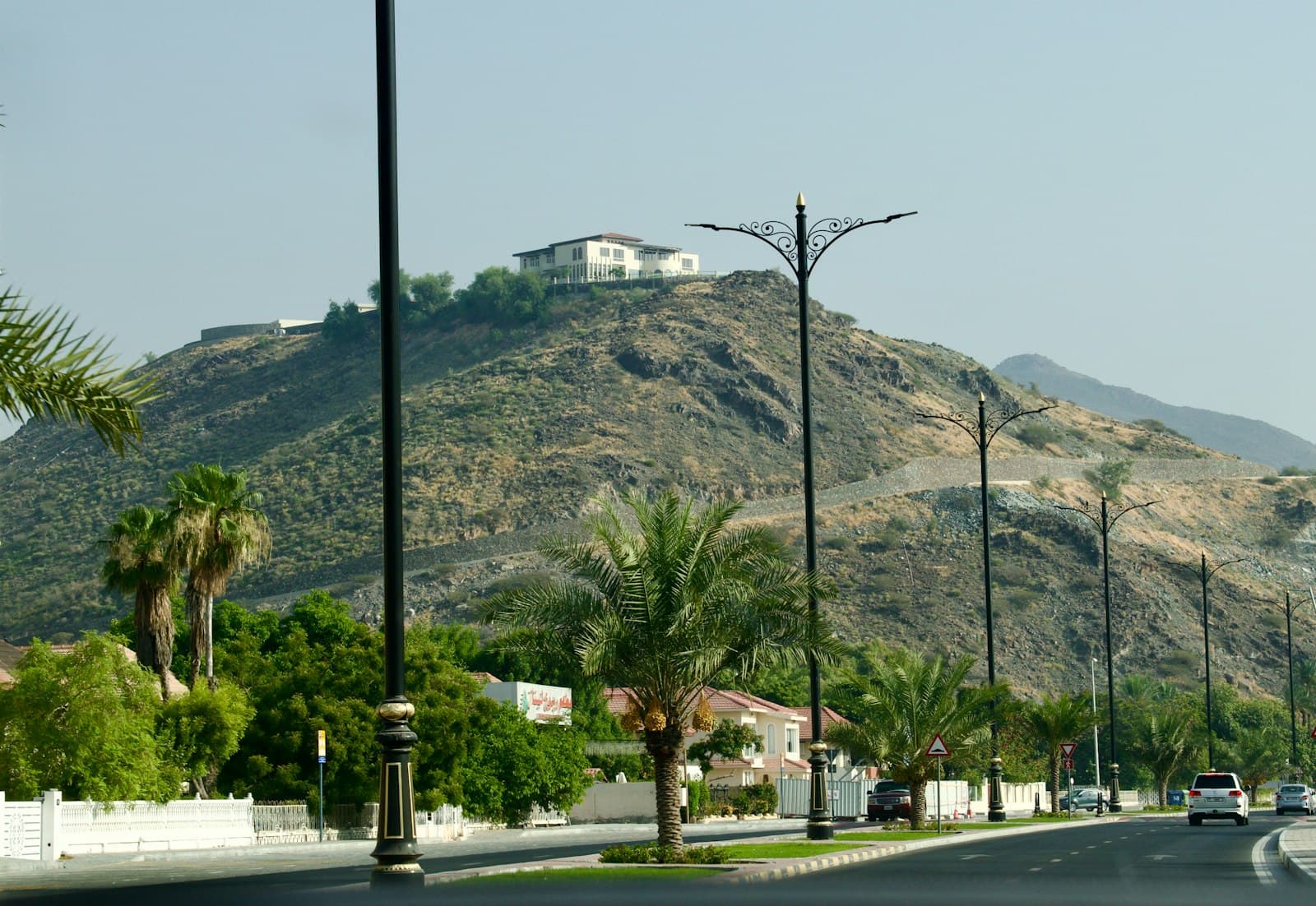 Fujairah — A street with a mountain in the background