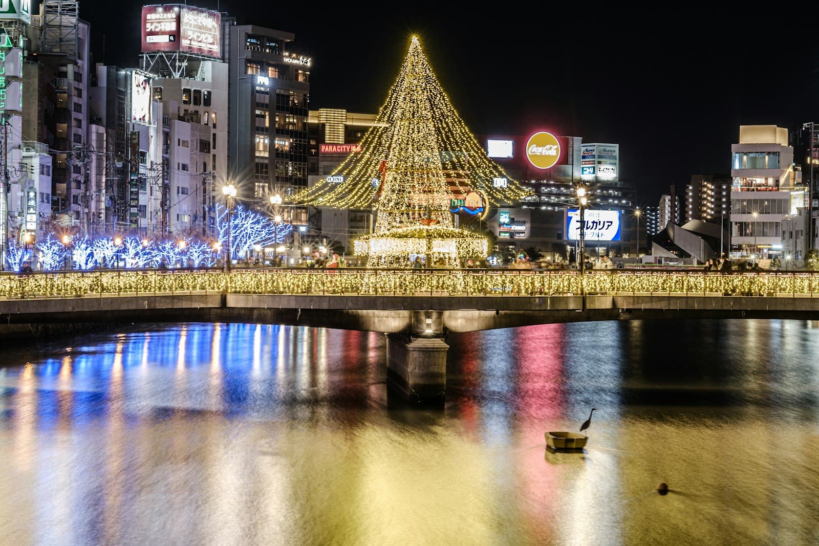 Fukuoka — a bridge over water with buildings in the background