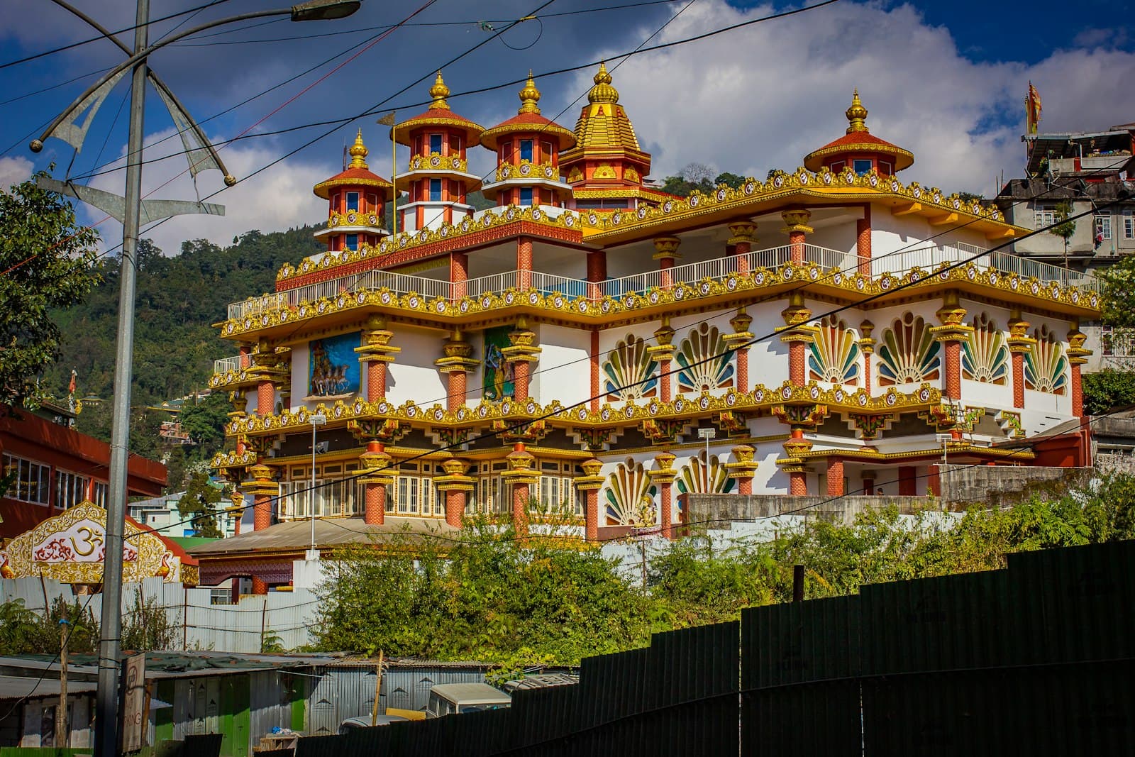 Gangtok — a colorful building with a lot of windows on top of it