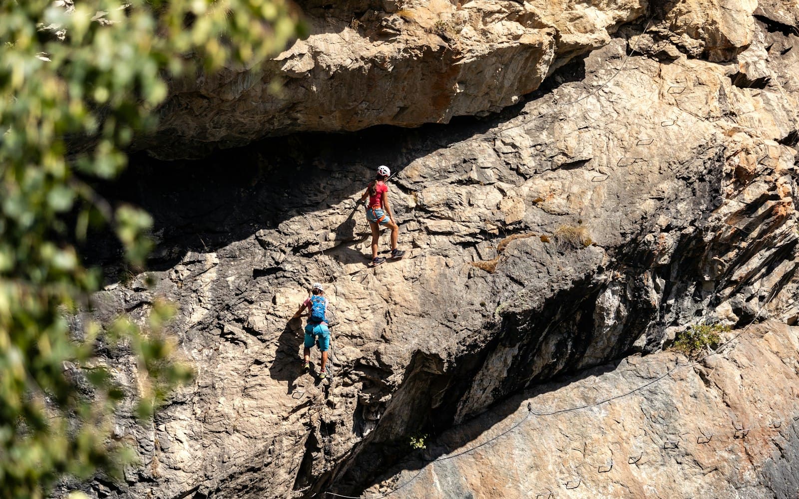 Gap — A group of people climbing up the side of a mountain