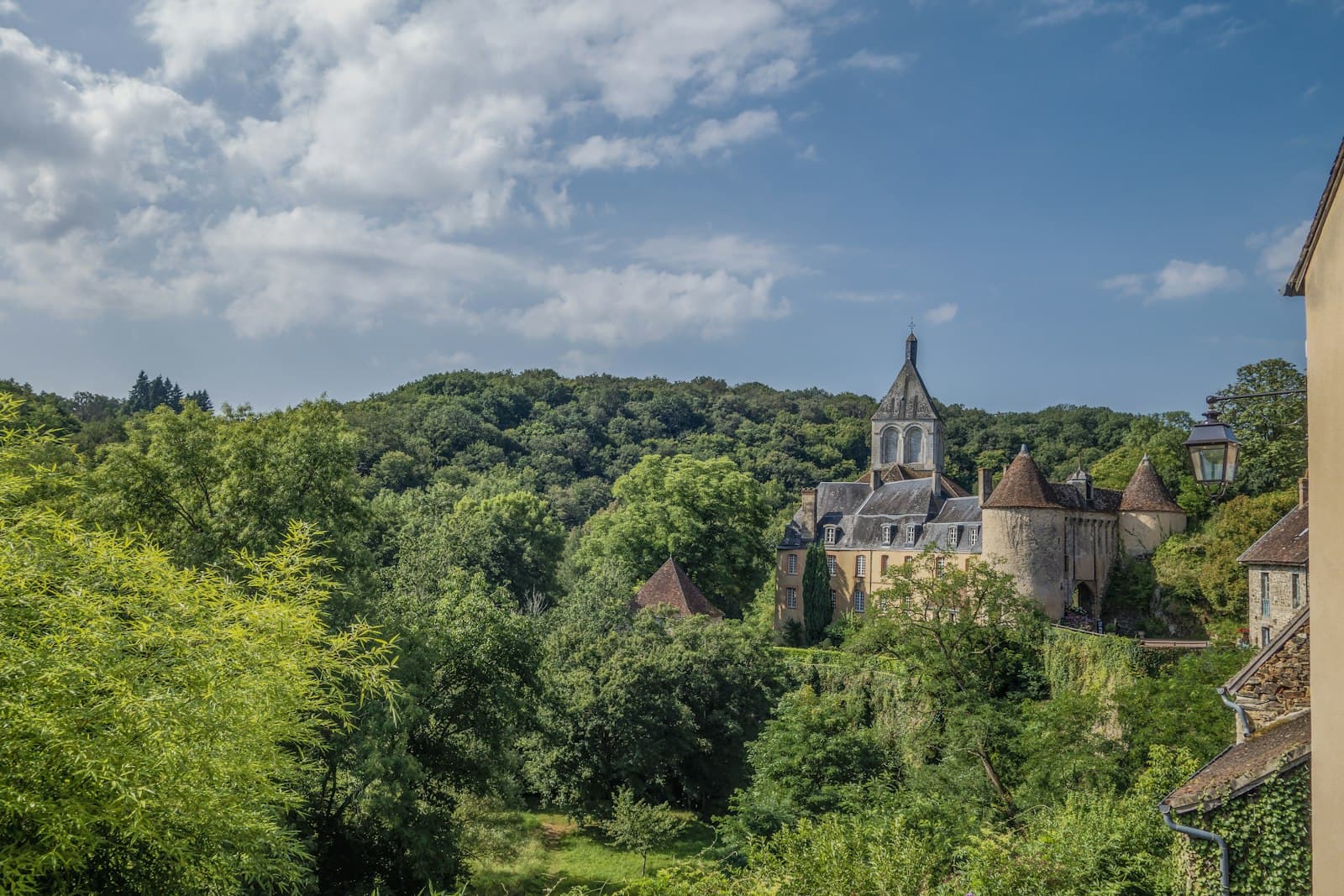 Gargilesse-Dampierre — a castle in the middle of a lush green forest