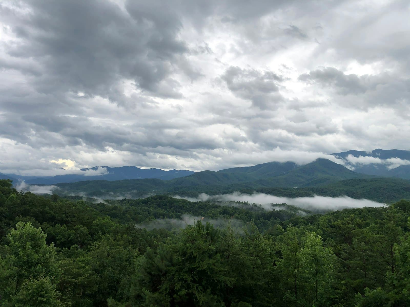 Gatlinburg — green trees and mountains under white clouds