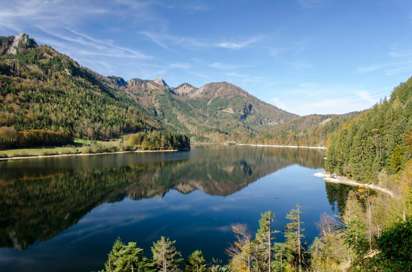 Gmunden — clear river surrounded by green leafed trees