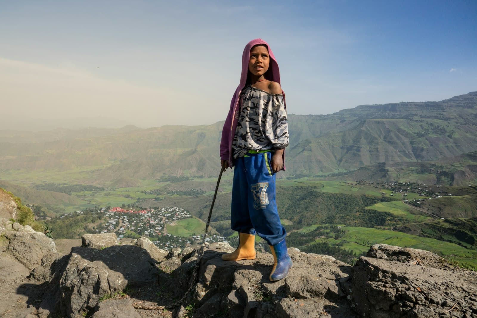 Gondar — boy standing on rocks