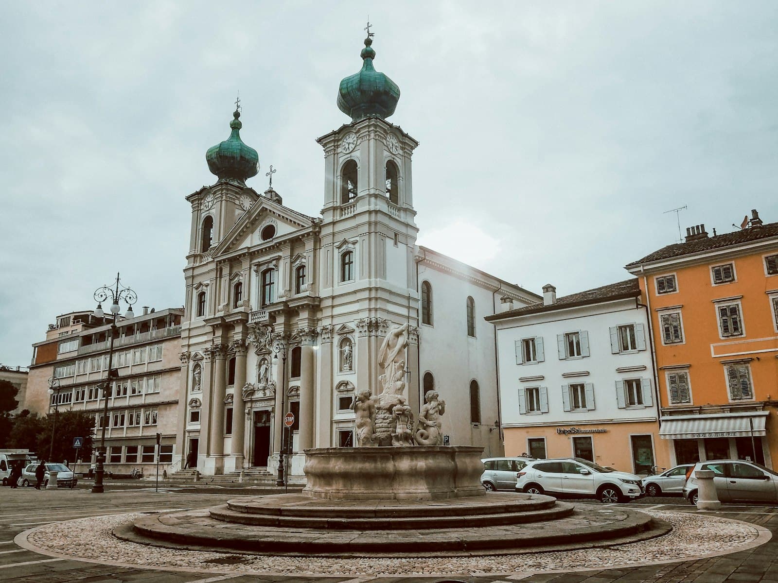 Gorizia — a building with a fountain in front of it