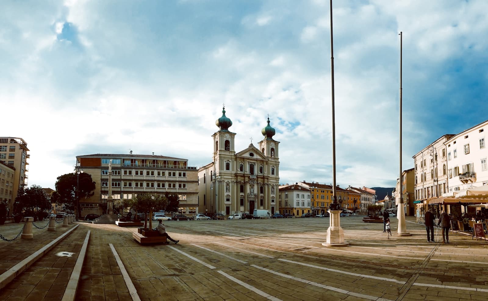 Gorizia — a square with a clock tower in the middle of it