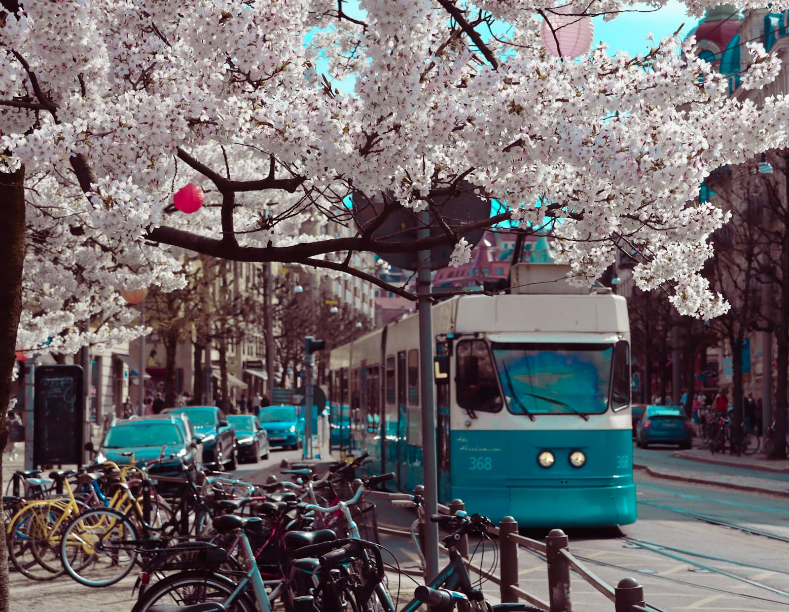 Gothenburg — a blue and white bus driving down a street