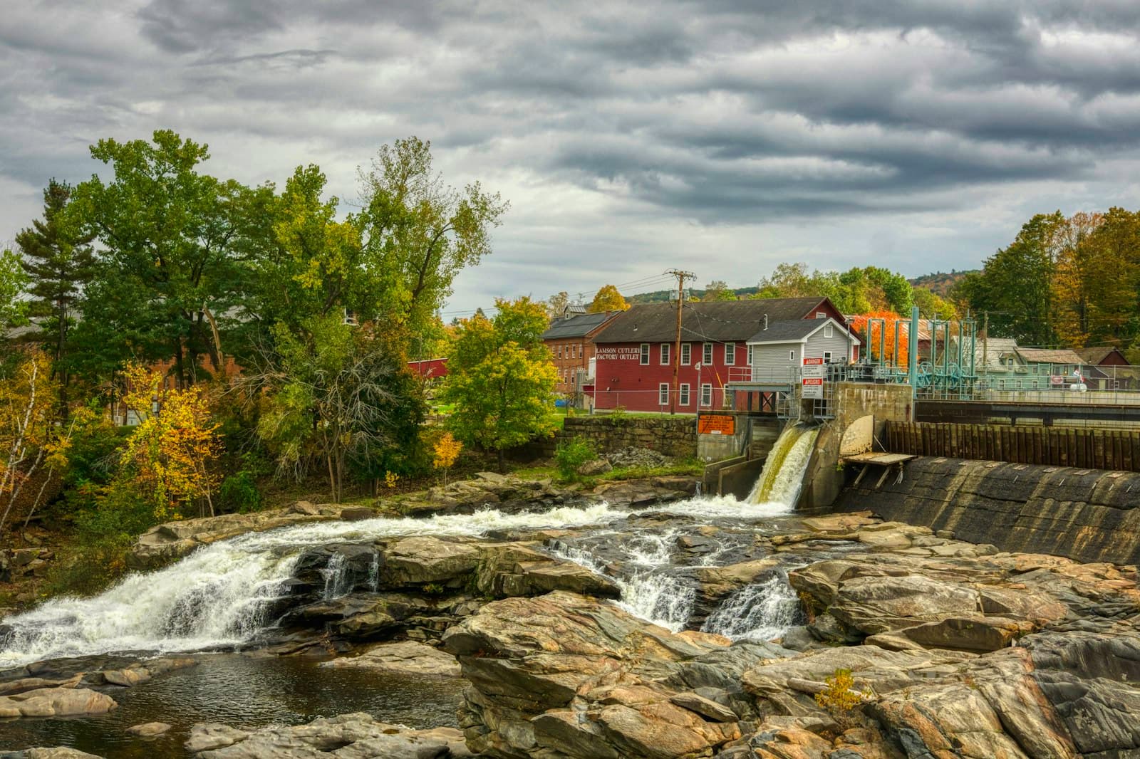 Great Falls — a river running through a lush green forest