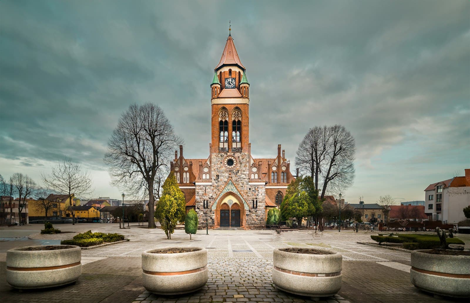 Grodzisk Wielkopolski — a large building with a clock on the top of it
