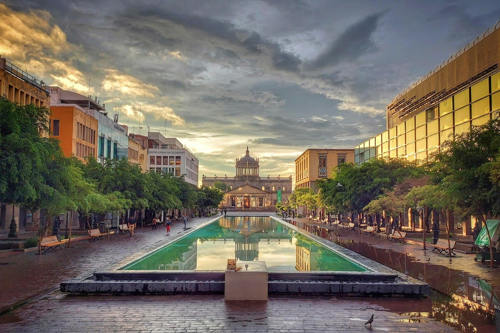Guadalajara — a city square with a fountain in the middle of it