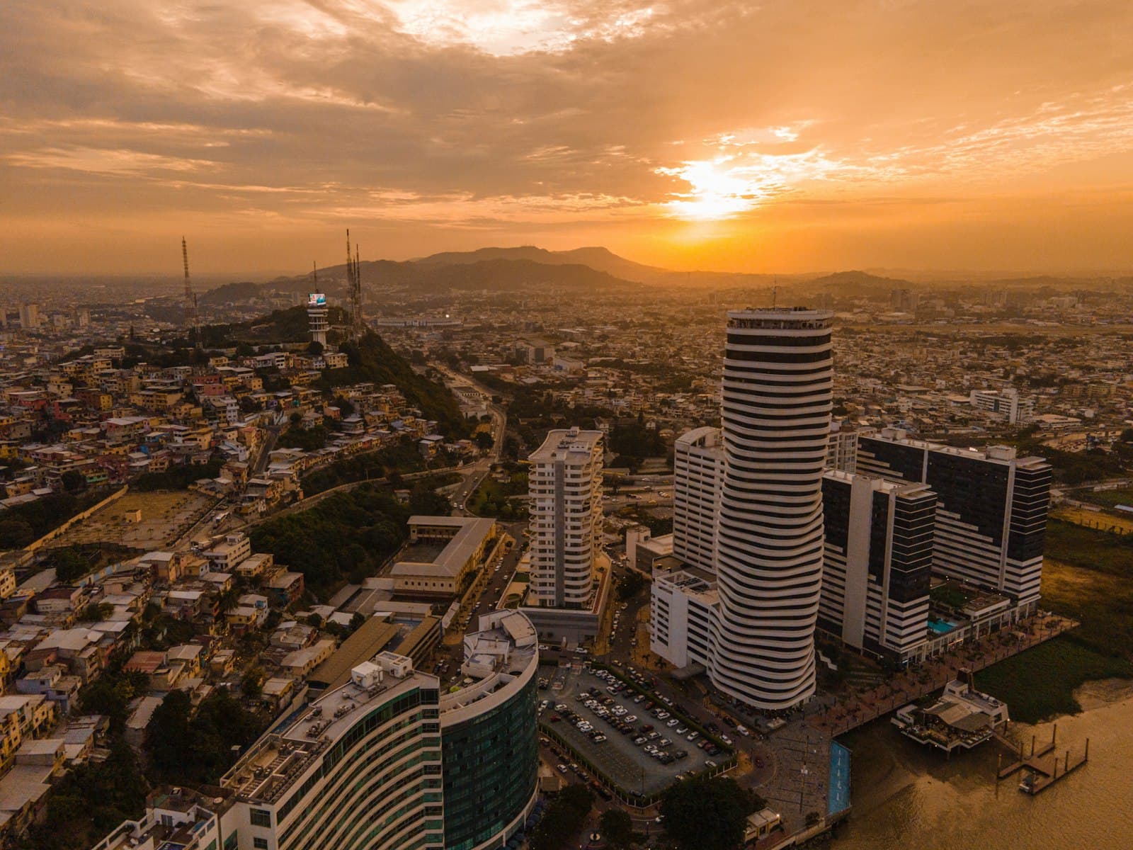 Guayaquil — aerial view of city buildings during sunset