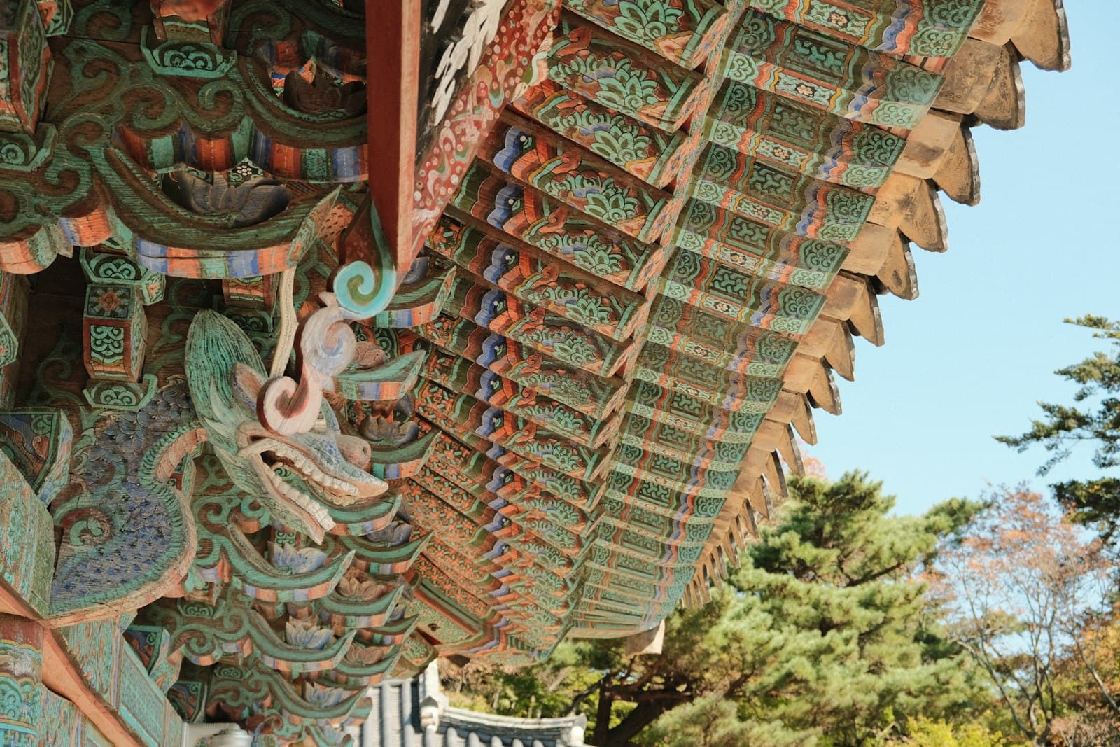 Gyeongju — a close up of a roof with a bird on it